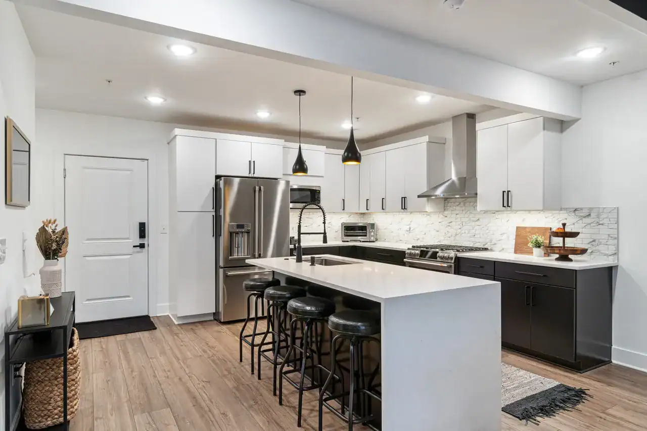 Custom home kitchen with large island and modern cabinetry in St. Petersburg, Florida